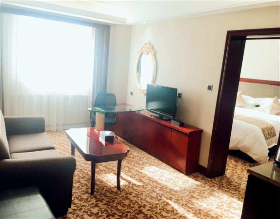 New Paris Hotel Harbin Exterior foto